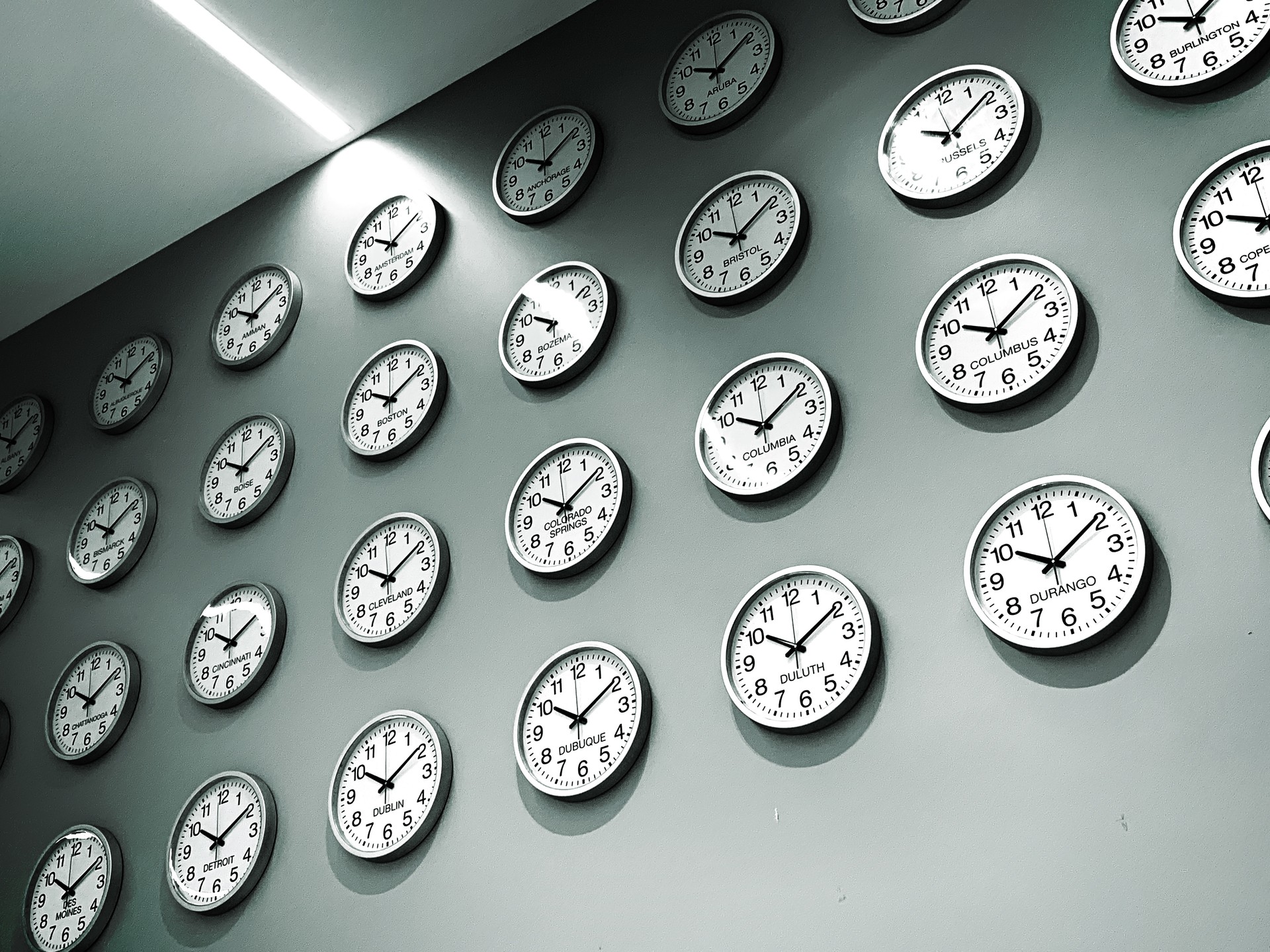 Wall of clocks for world cities and time zones